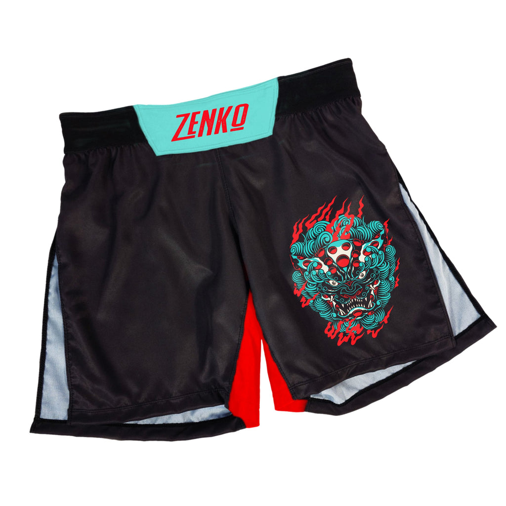 Flat lay of Zenko Fightwear Komainu High Split Shorts in red and black